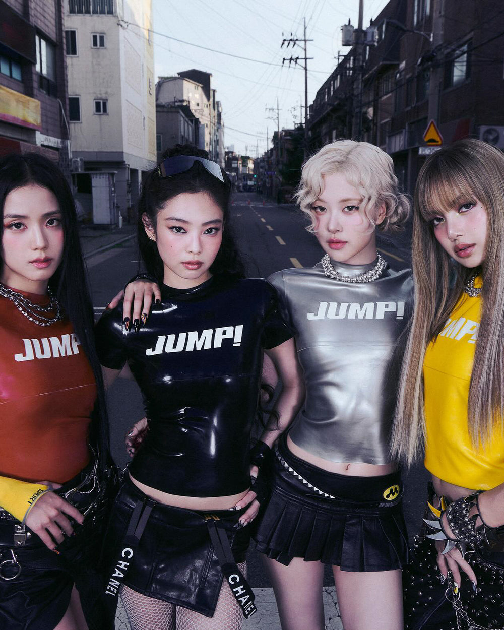 Blackpink band wears latex Jump Tee by Bustedbrand Latex